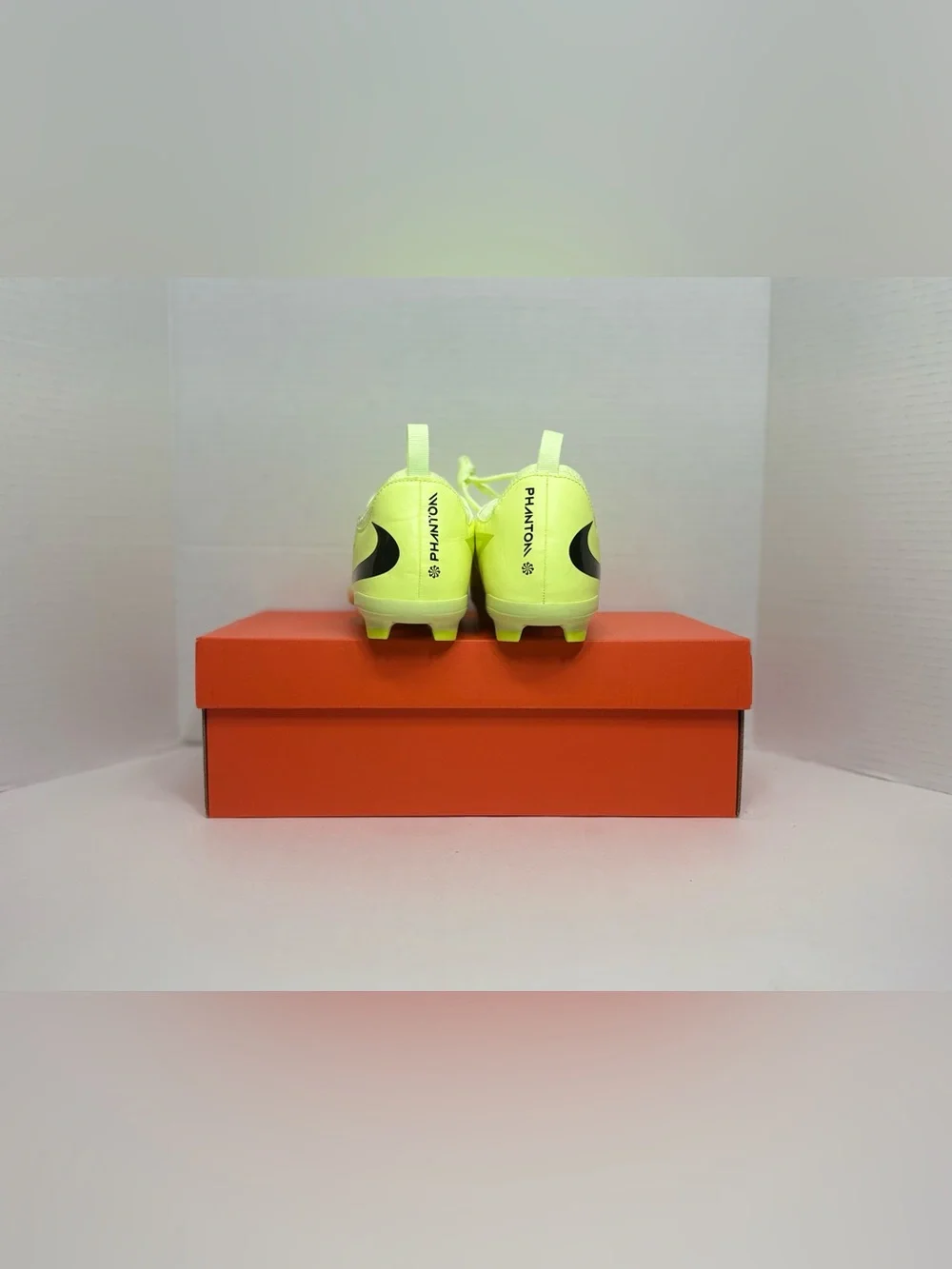 Nike Neon Yellow Soccer Cleats with Orange and Black Accents